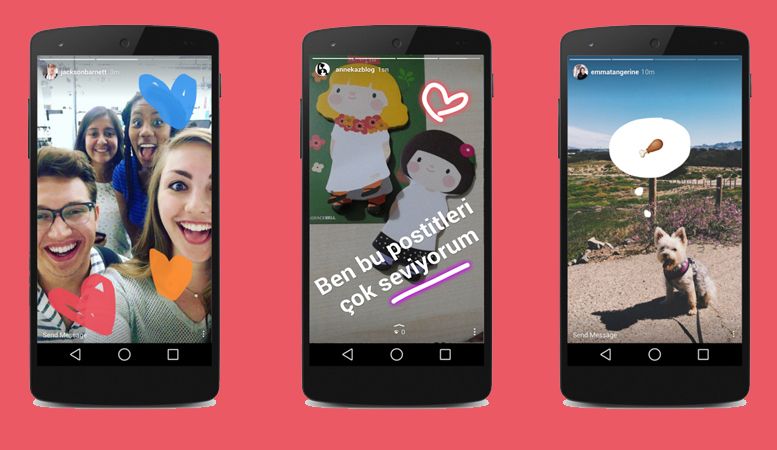 Three friends taking a selfie on a phone screen with colorful heart stickers overlaid on the image.