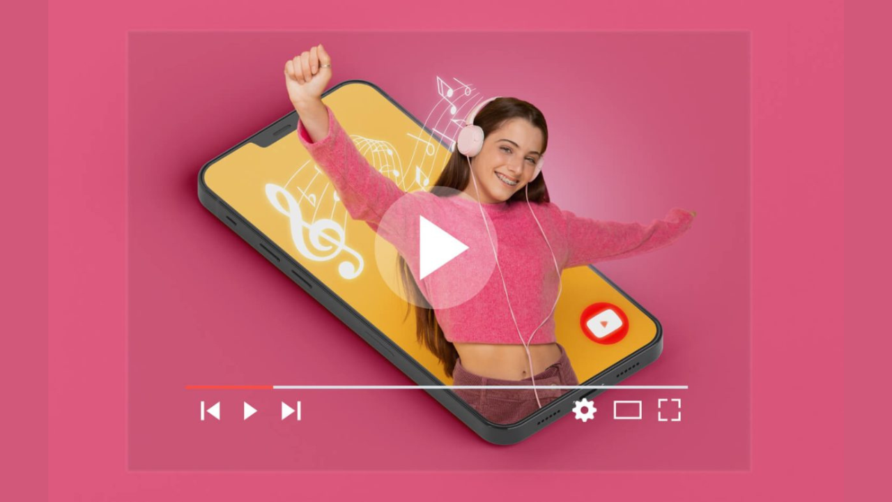 Young woman in a pink sweater with headphones poses on a tilted smartphone with a large white play button on screen, pink background.