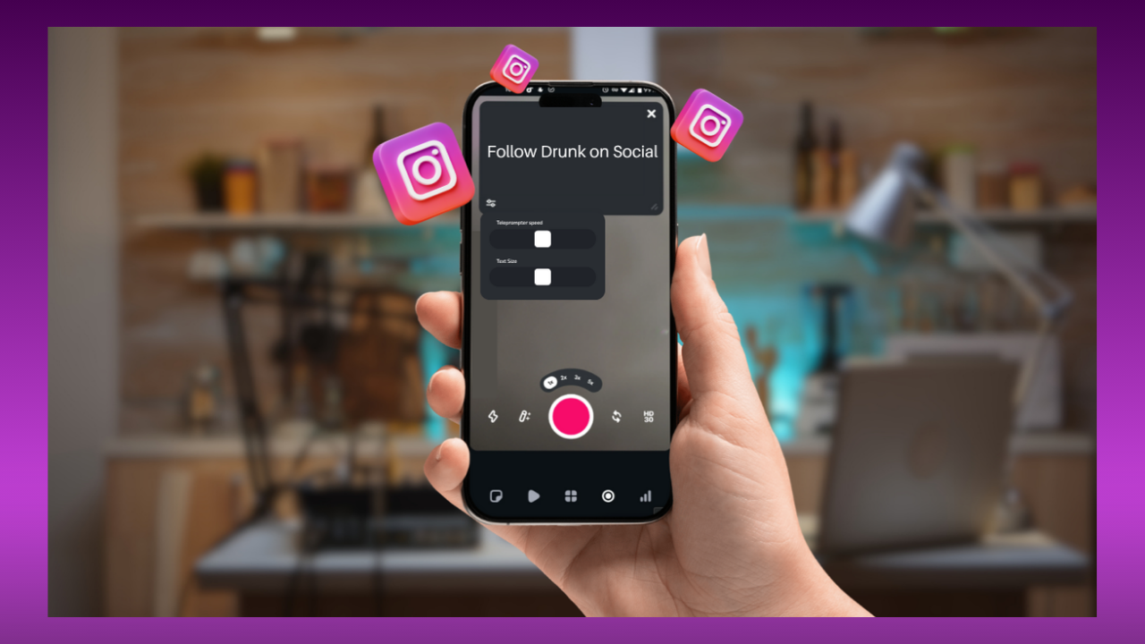 Hand holding a smartphone displaying a video recording app with a large pink record button and Instagram stickers around it, in a blurred workshop background